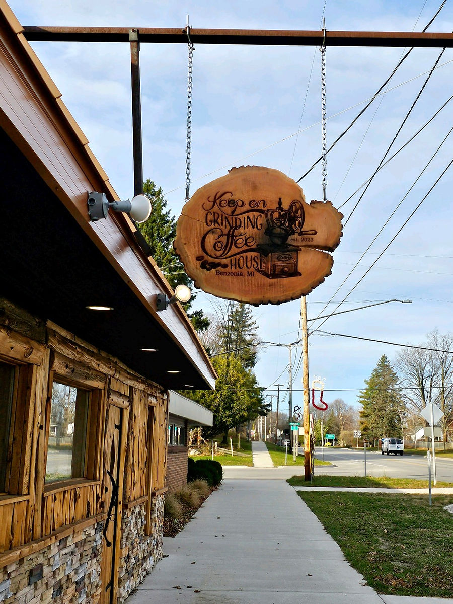 Keep On Grinding Coffee House sign in Benzonia, Michigan