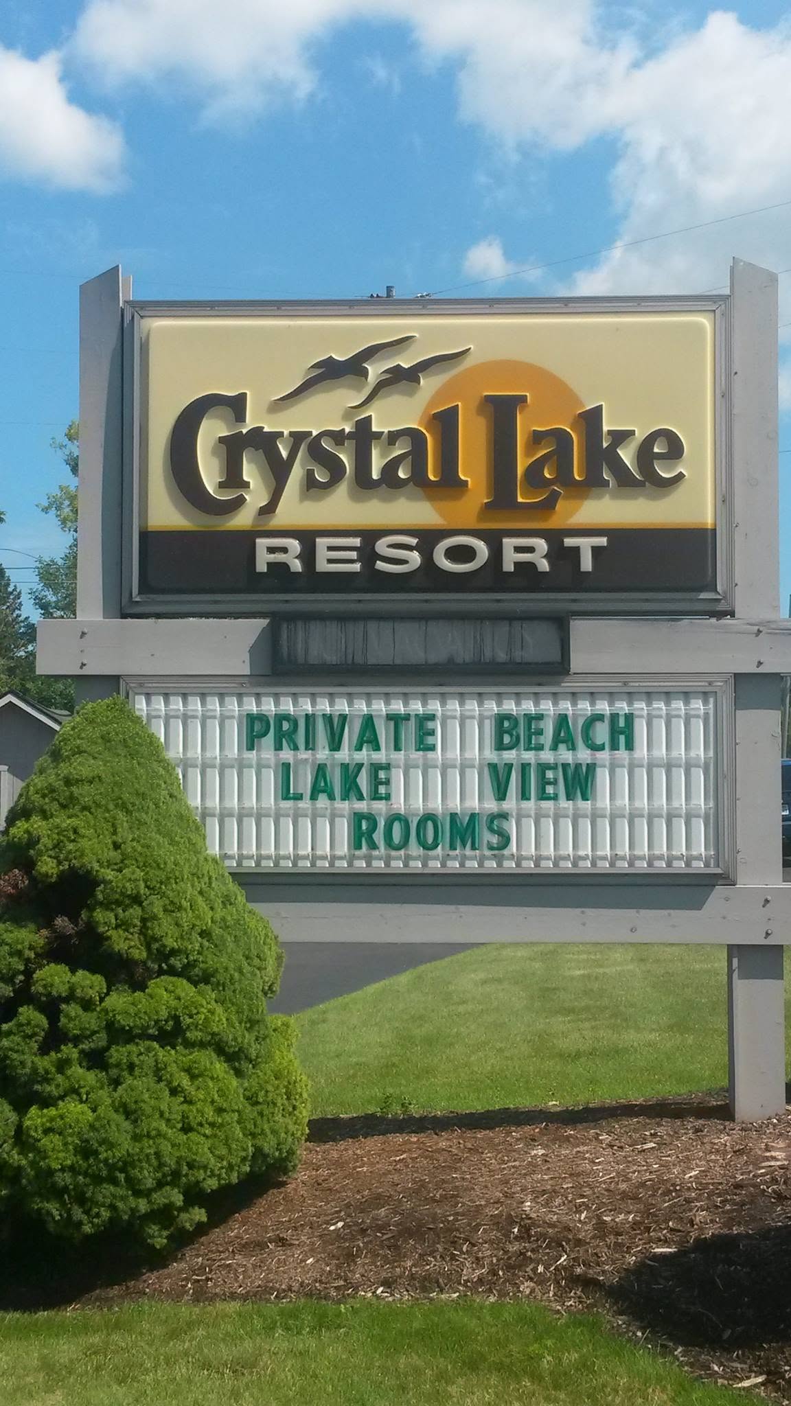 Crystal Lake Resort entrance sign — Private Beach, Lake View Rooms